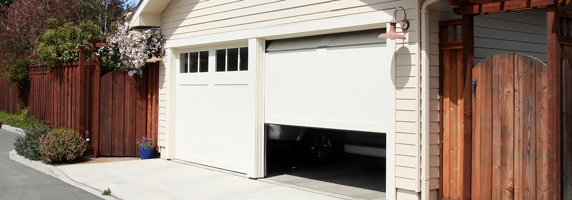 Fix Metal Garage Door Jerking in Huntley, Illinois